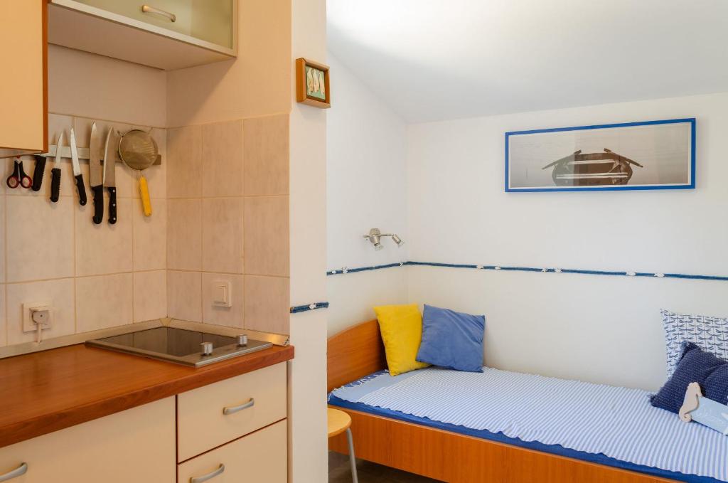 Posteľ alebo postele v izbe v ubytovaní Namoru apartaments