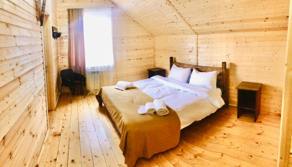 Postel nebo postele na pokoji v ubytování COTTAGE CHALET and TOURS