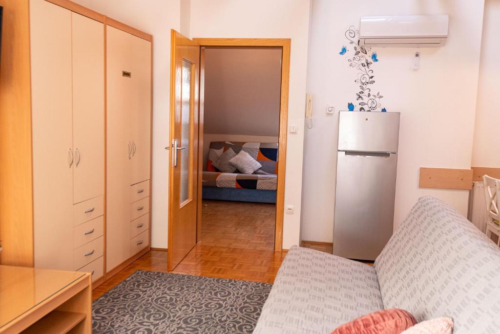 Postel nebo postele na pokoji v ubytování Apartment Stella