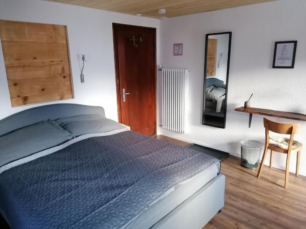 Postel nebo postele na pokoji v ubytování Room's chez BeNi