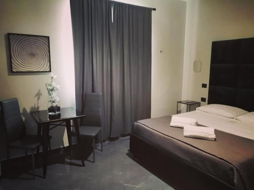 Postel nebo postele na pokoji v ubytování Hotel Elite