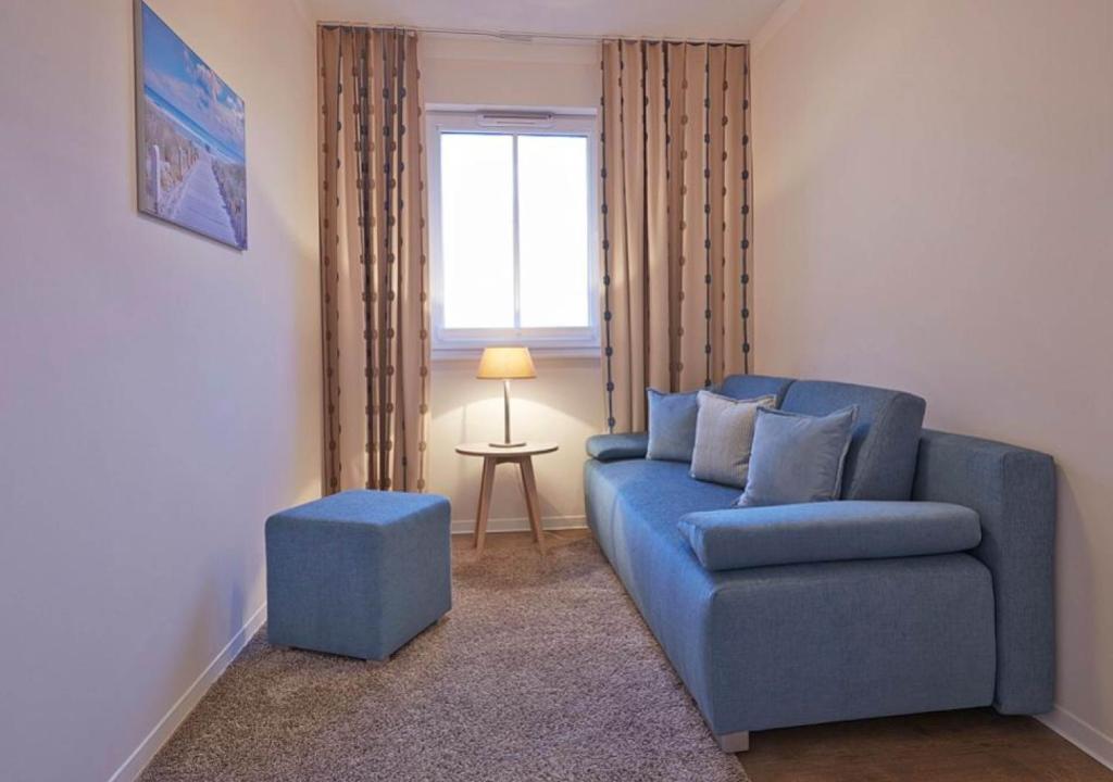 Posezení v ubytování Aparthotel Waterkant Suites - Fewos am Meer mit SPA
