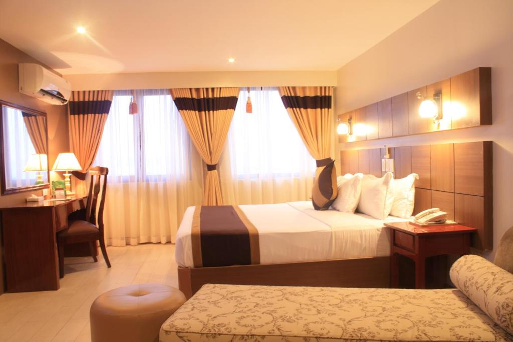 Katil atau katil-katil dalam bilik di The Pinnacle Hotel and Suites