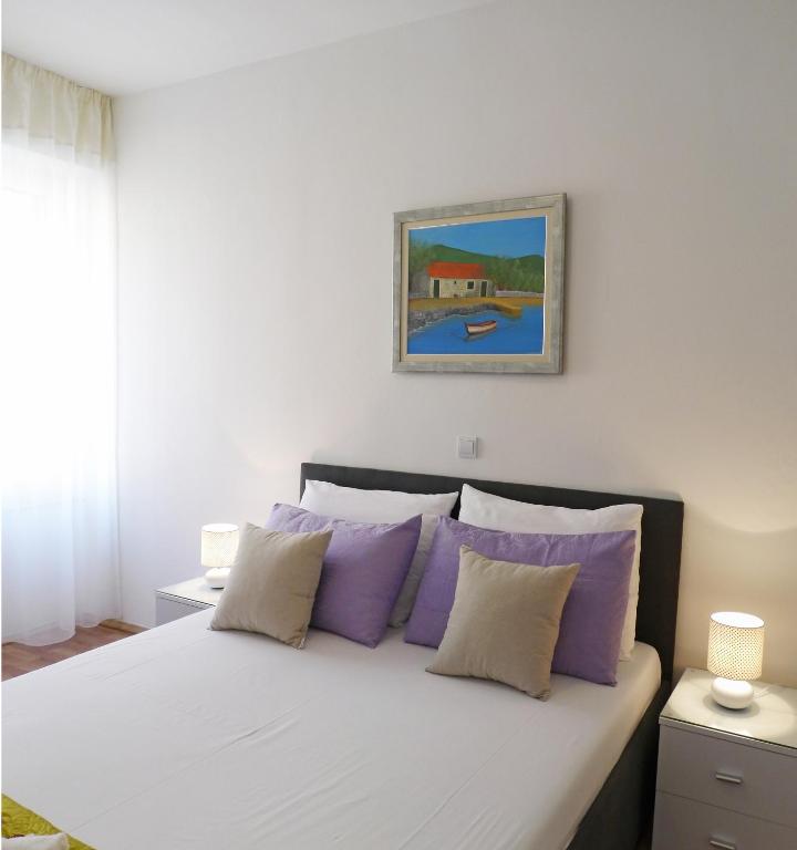 Postel nebo postele na pokoji v ubytování A&M Apartment and Rooms