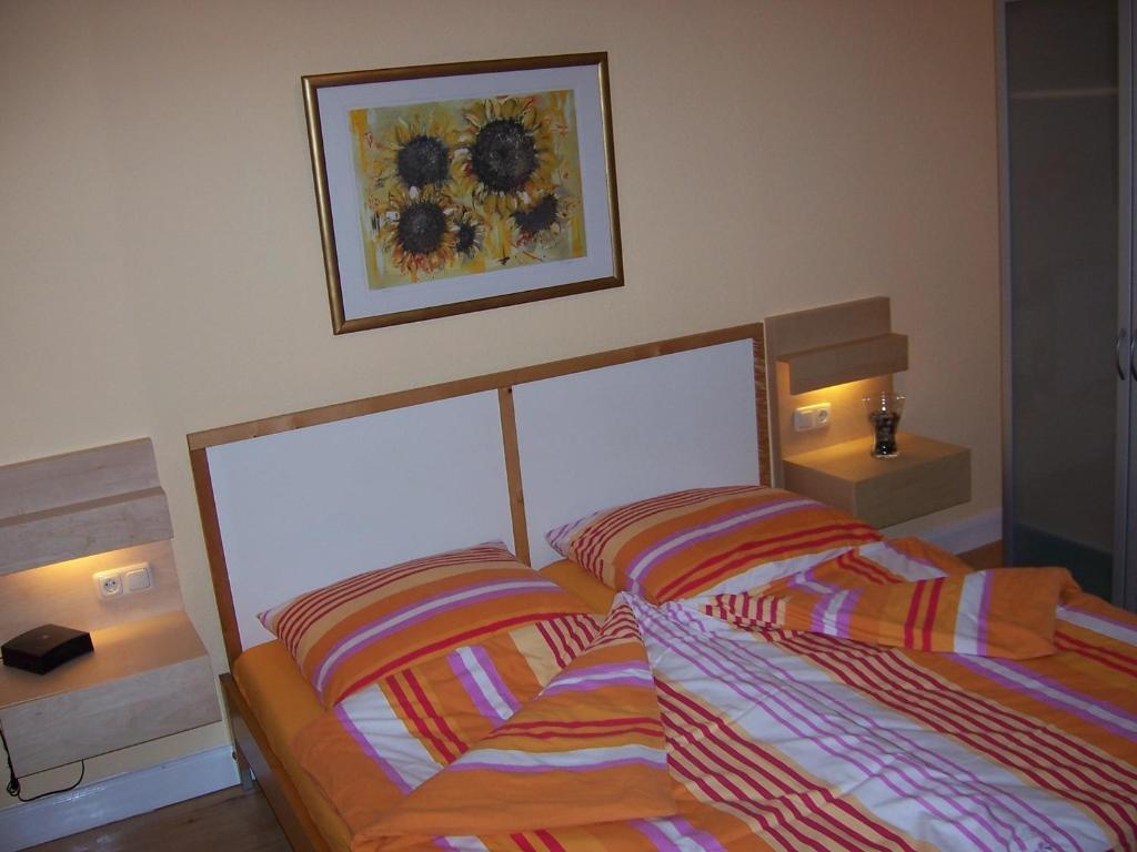 Postel nebo postele na pokoji v ubytování DARZ GästeZimmer