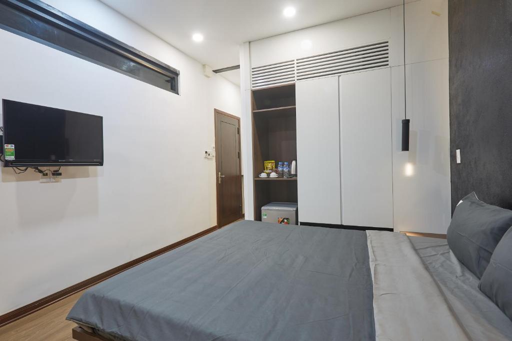 TV a/nebo společenská místnost v ubytování The Garden Capsule Hotel