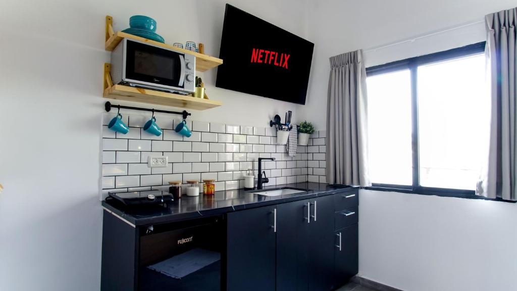 Kuchyň nebo kuchyňský kout v ubytování Mayer 8 Hotel By Peraia