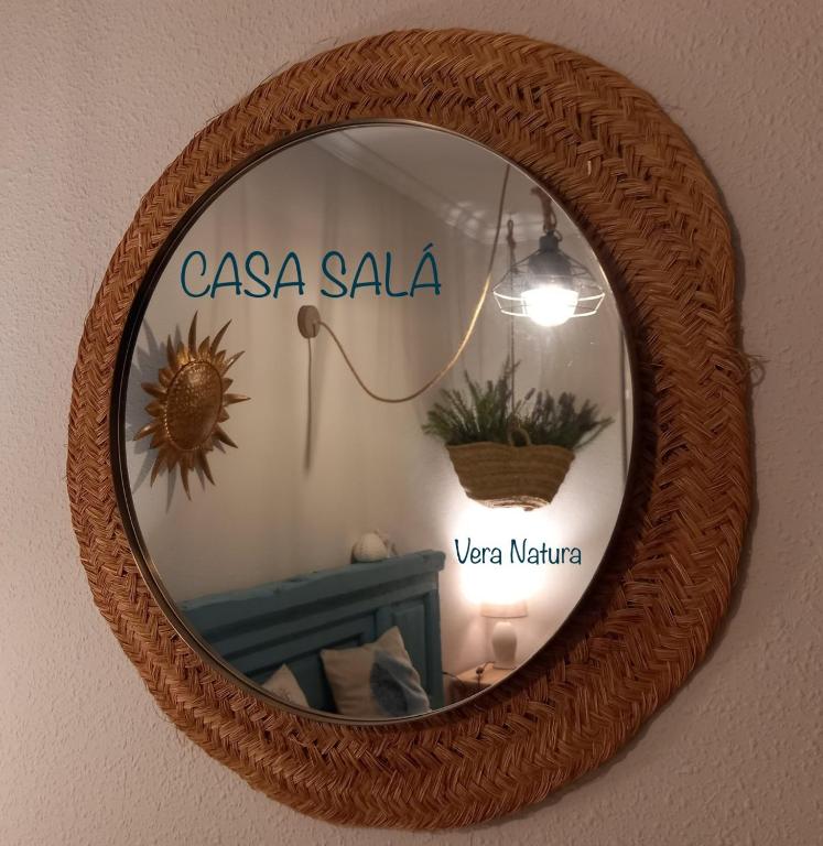 a mirror with the words casa sala in a room at Casa Salá, alojamiento con encanto en Vera Natura in Vera