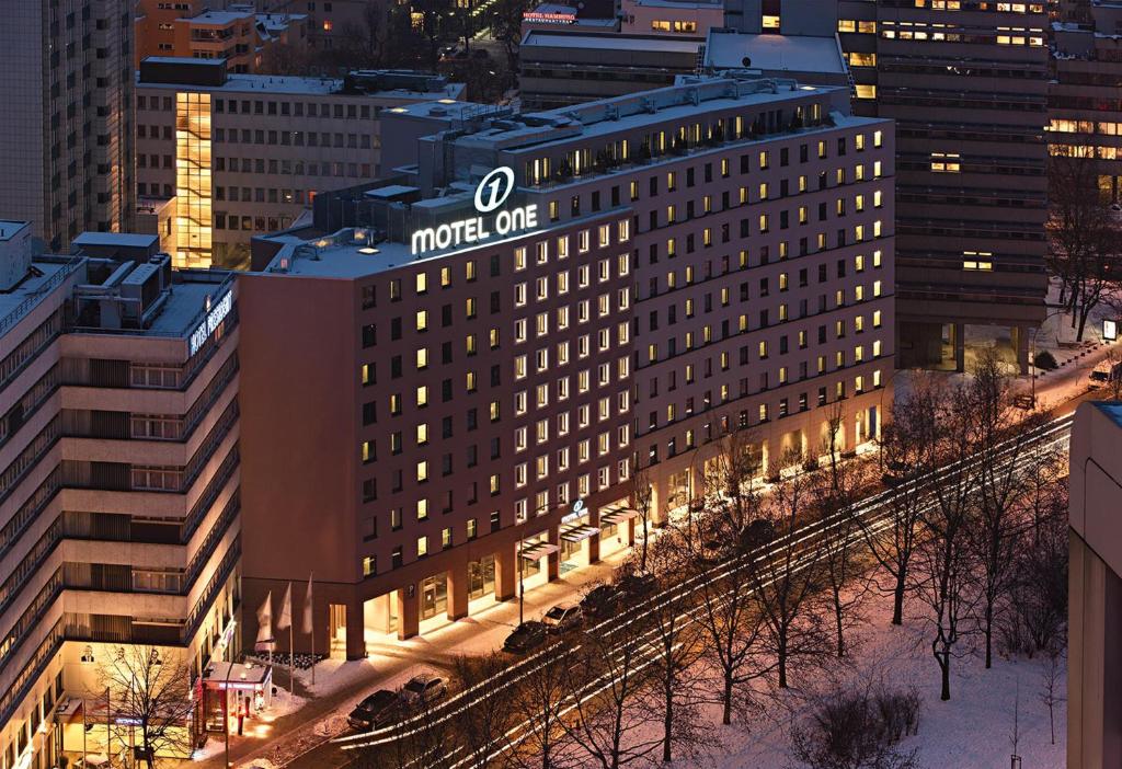 a large building with a clock on it at Motel One Berlin-Tiergarten in Berlin