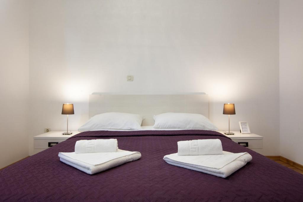 Posteľ alebo postele v izbe v ubytovaní Apartment City Strand