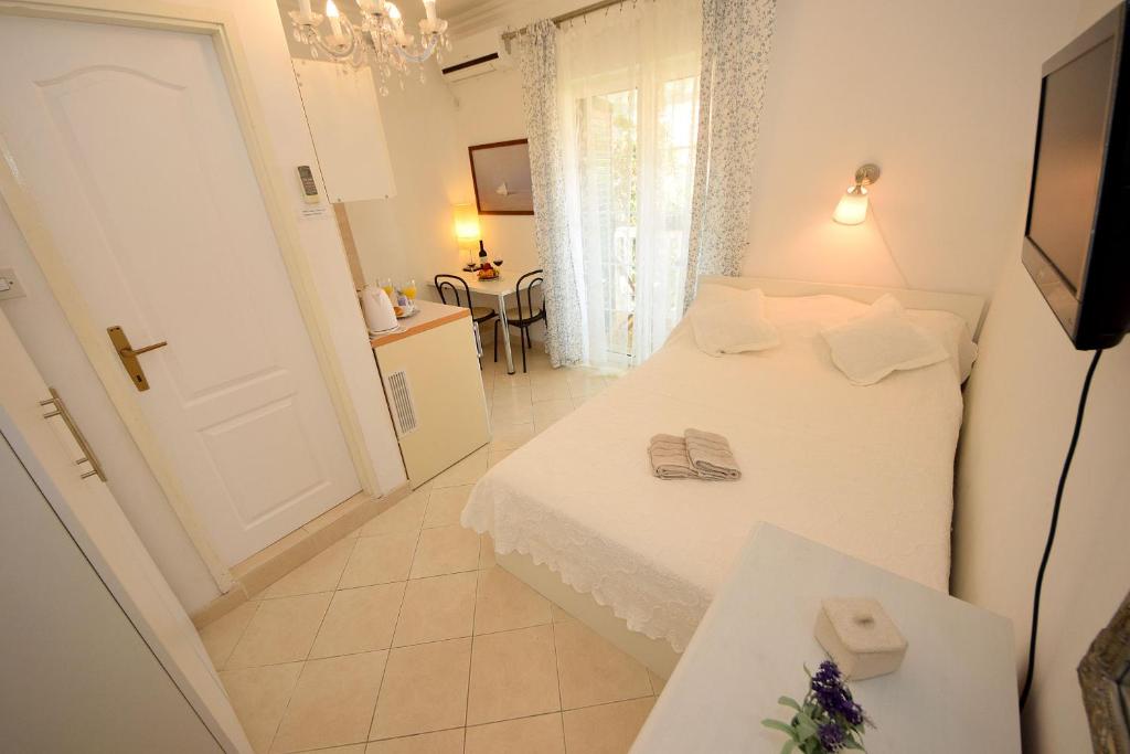 Posteľ alebo postele v izbe v ubytovaní Apartments Cale
