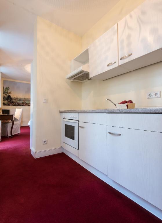 A cozinha ou cozinha compacta de DIRAZI Guesthouse & Apartments GmbH