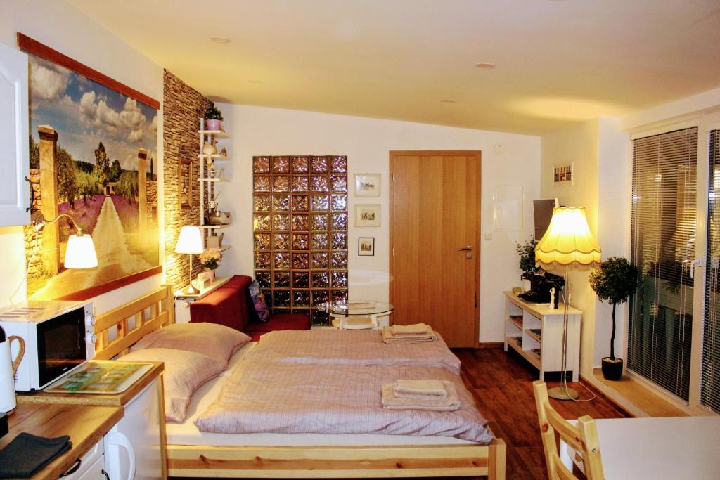 Postel nebo postele na pokoji v ubytování Apartmá Za kopcem