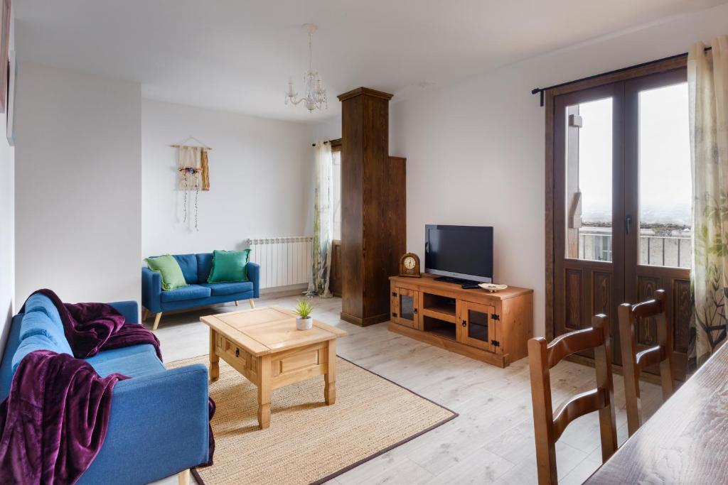 TV a/nebo společenská místnost v ubytování APARTAMENTO CASA PALOMA