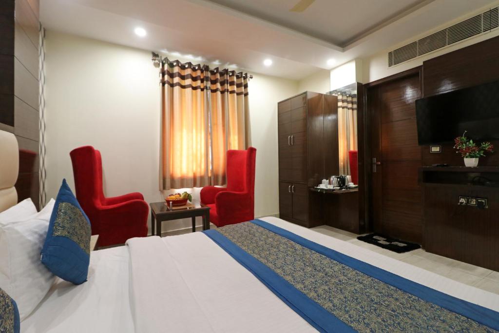 Cama o camas de una habitación en Hotel Mannat international by Mannat
