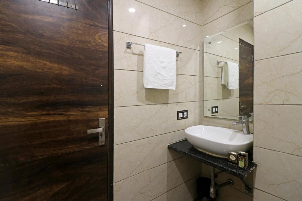 Un baño de Hotel Mannat international by Mannat