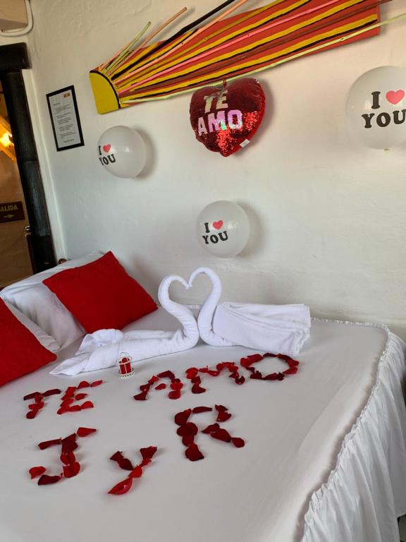 Postel nebo postele na pokoji v ubytování Hotel La Barca
