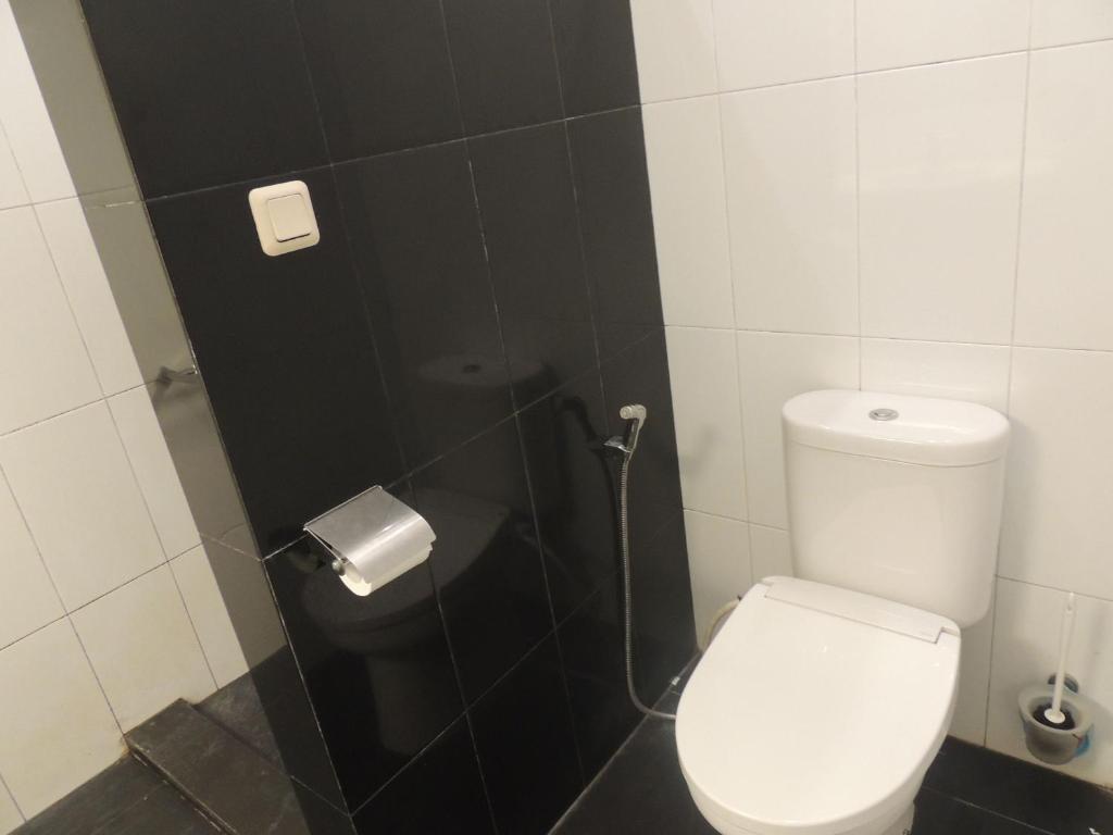 Koupelna v ubytování Oase Van Java