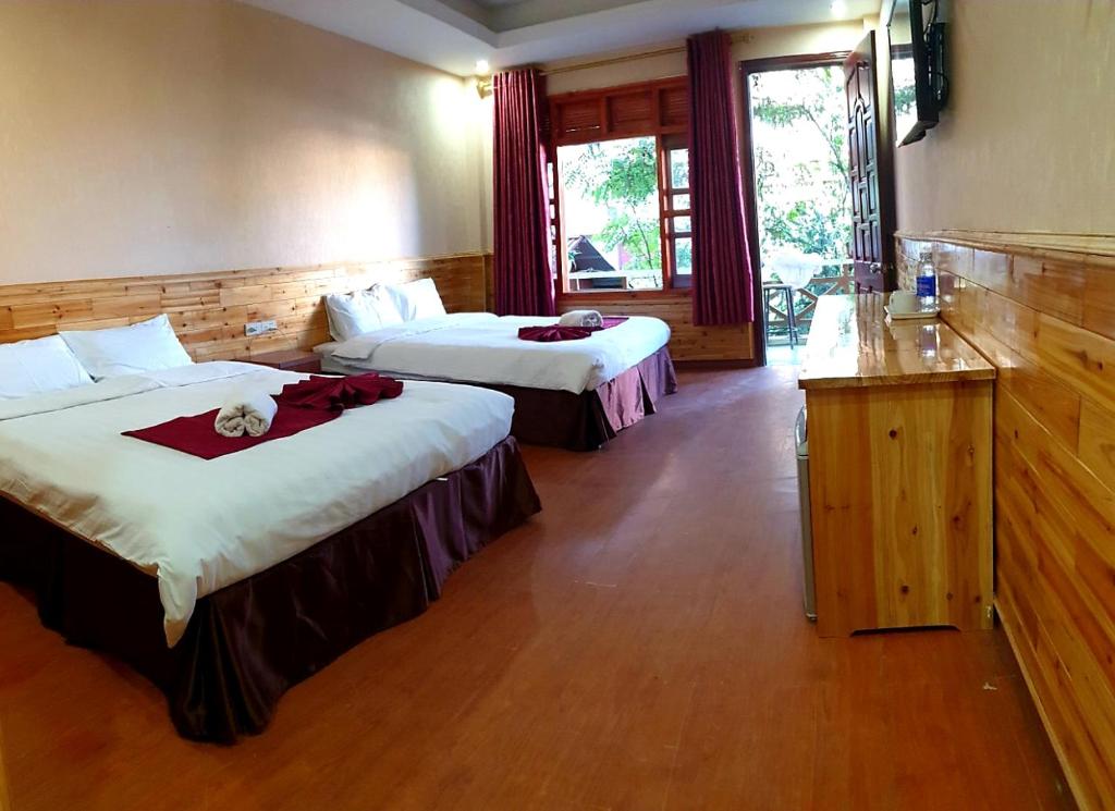 Postel nebo postele na pokoji v ubytování Dang Khoa Homestay