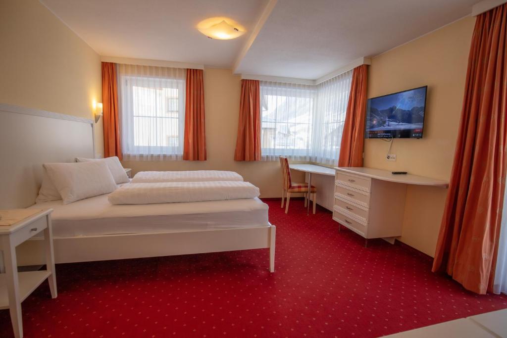Posteľ alebo postele v izbe v ubytovaní The Hotel - himmlisch wohlfühlen