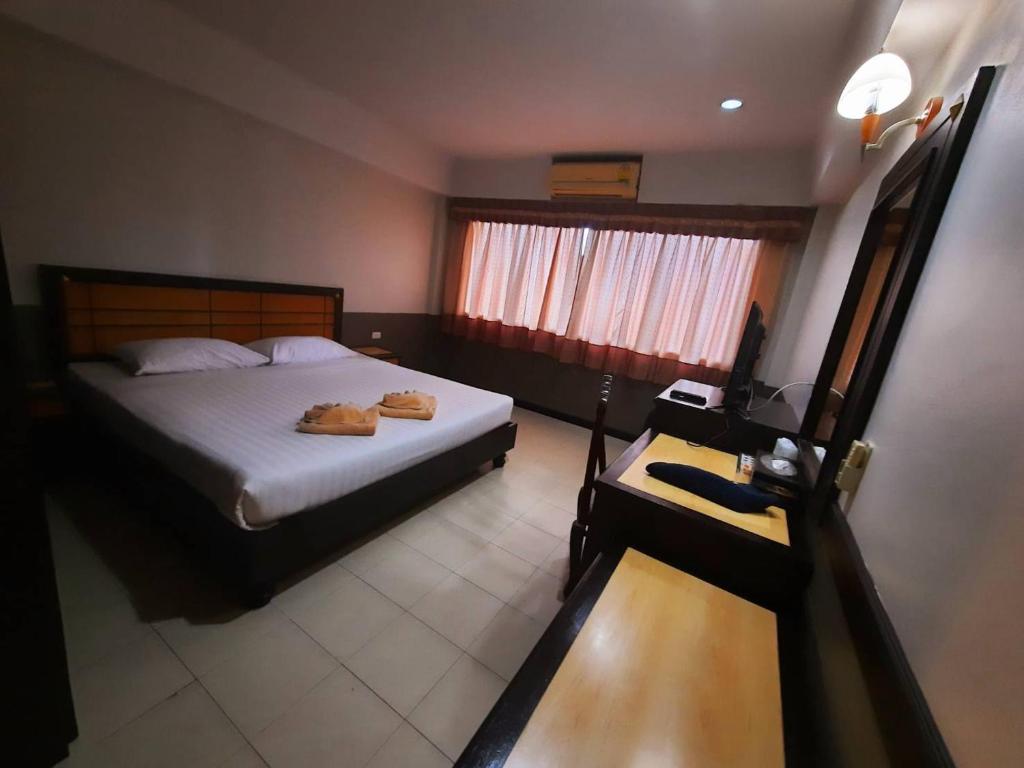 Letto o letti in una camera di Ariya inn Chiangrai