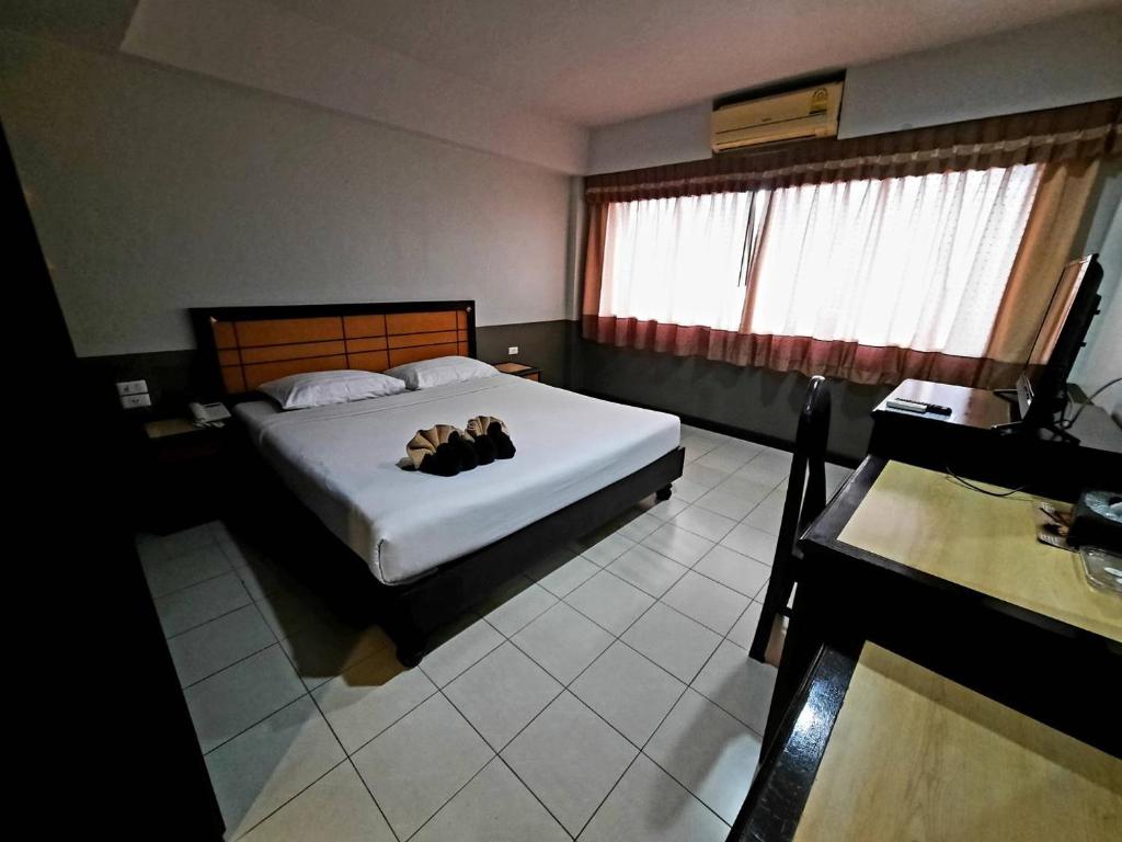 Letto o letti in una camera di Ariya inn Chiangrai