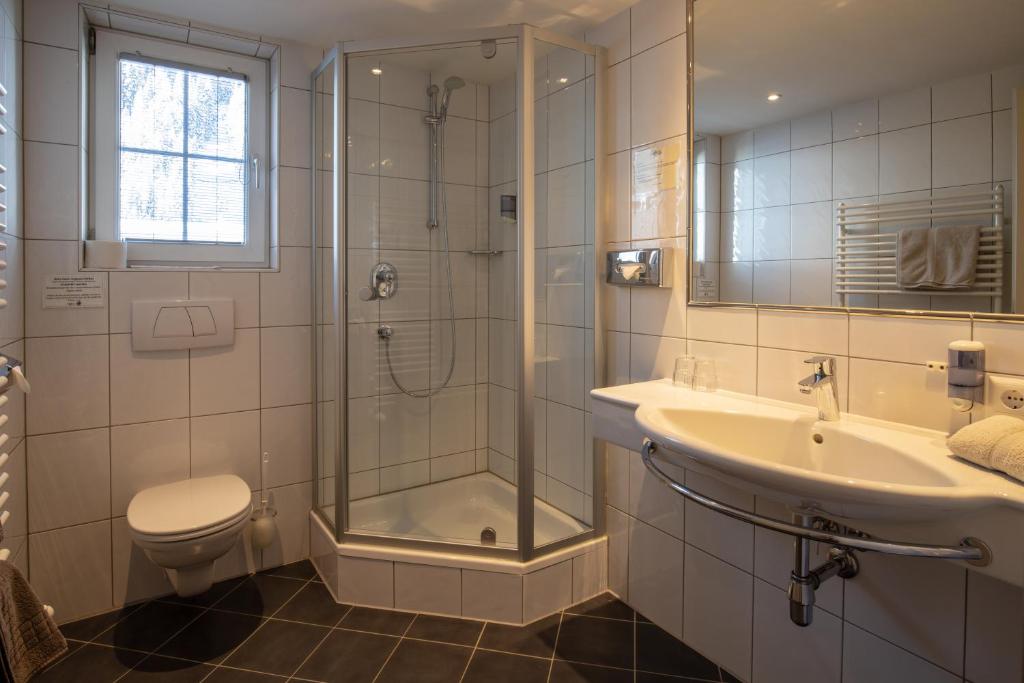 Kúpeľňa v ubytovaní The Hotel - himmlisch wohlfühlen