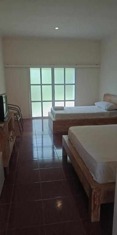 Postel nebo postele na pokoji v ubytování Hotel SeaSide lovina