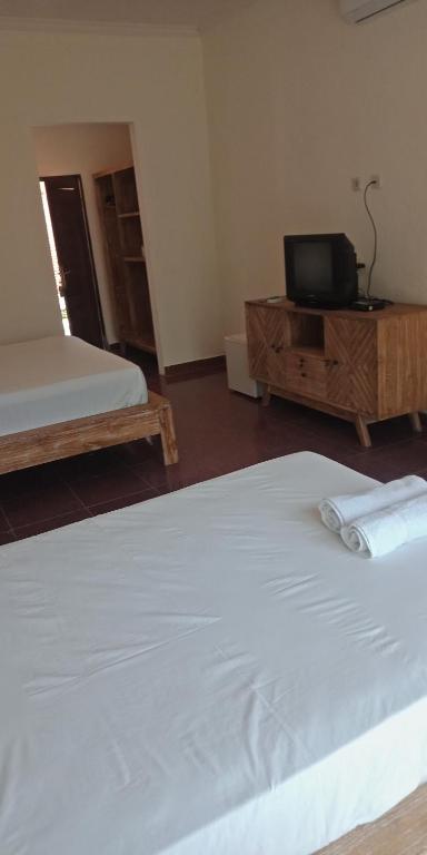 Postel nebo postele na pokoji v ubytování Hotel SeaSide lovina
