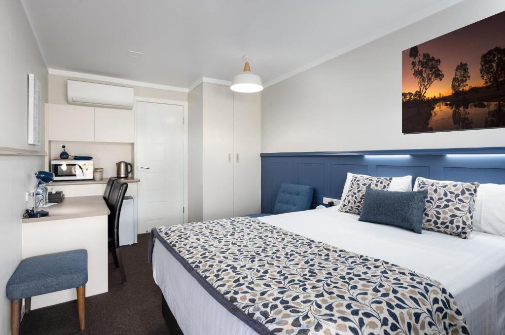Postel nebo postele na pokoji v ubytování Granite Belt Motel