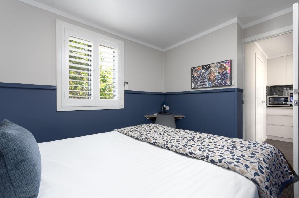 Postel nebo postele na pokoji v ubytování Granite Belt Motel