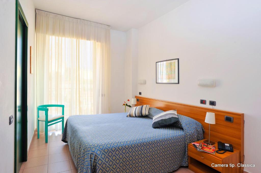 Posteľ alebo postele v izbe v ubytovaní Excelsior Hotel E Appartamenti