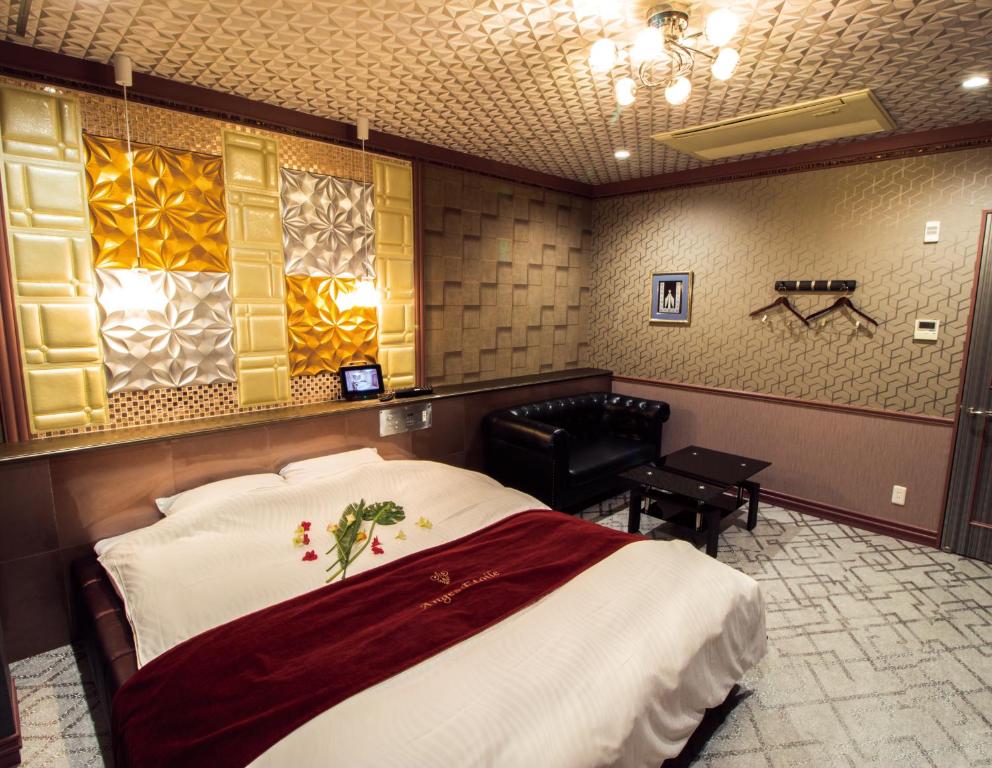 Postel nebo postele na pokoji v ubytování ホテル アンジュエトワール 堺 - Adult Only