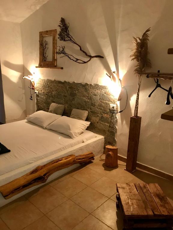 Postel nebo postele na pokoji v ubytování I Ginepri