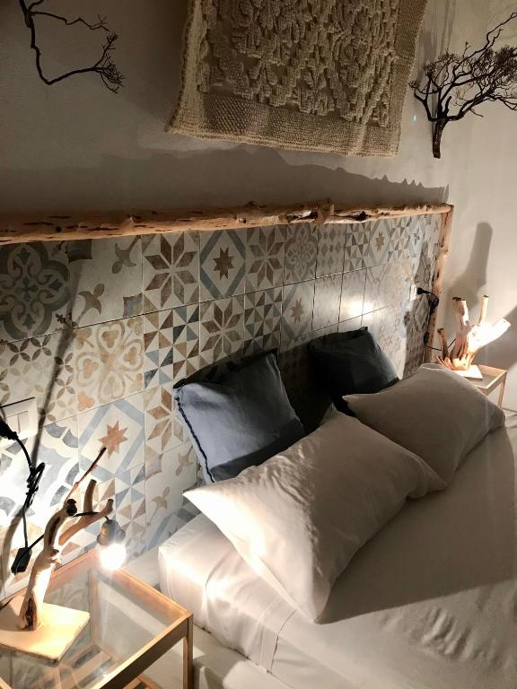 Postel nebo postele na pokoji v ubytování I Ginepri