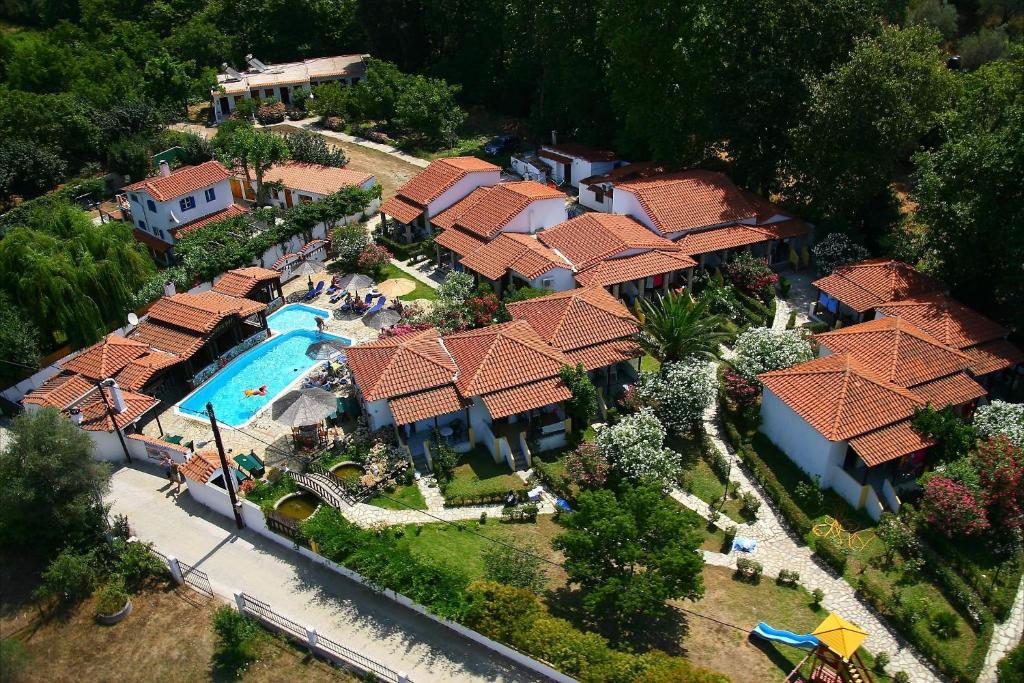 an aerial view of a house with a swimming pool at Elizabeth Studios in Skiathos