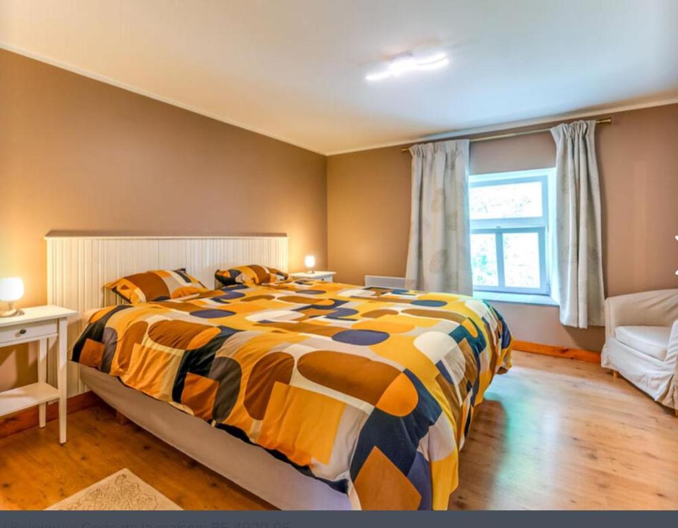 Postel nebo postele na pokoji v ubytování Petit Château de Harzé