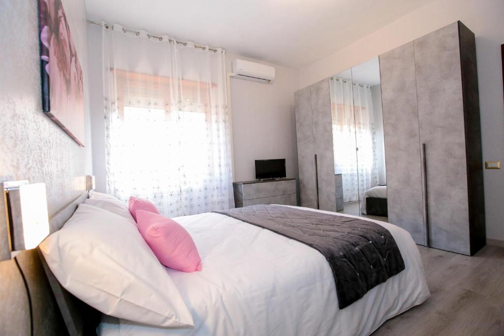 Postel nebo postele na pokoji v ubytování Bed & Breakfast La Rosa