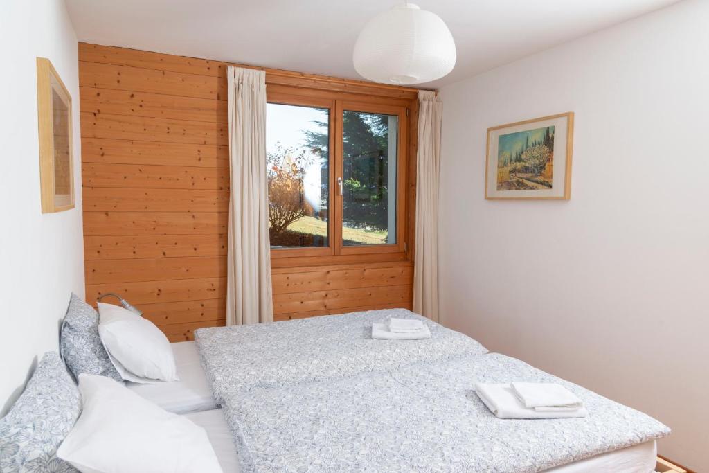 Postel nebo postele na pokoji v ubytování Chalet Lyngen