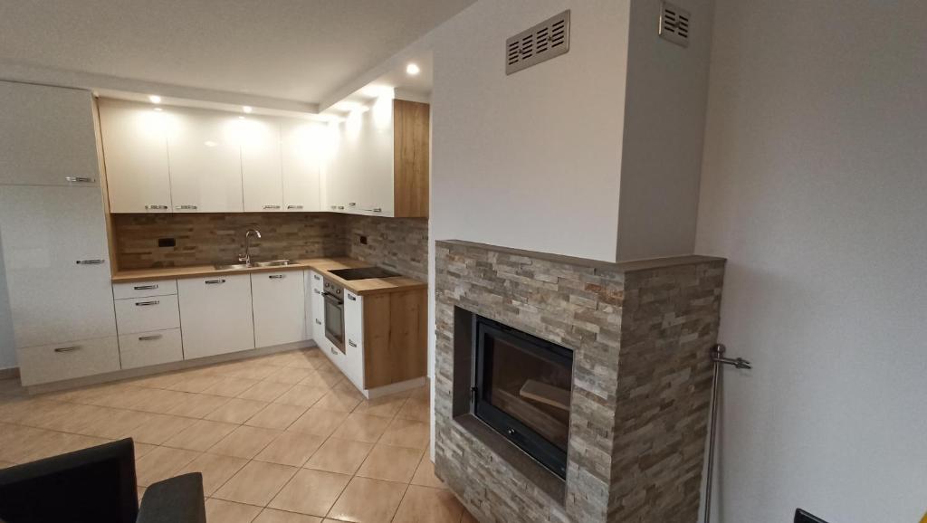 Kuchyň nebo kuchyňský kout v ubytování Apartma Apollonio