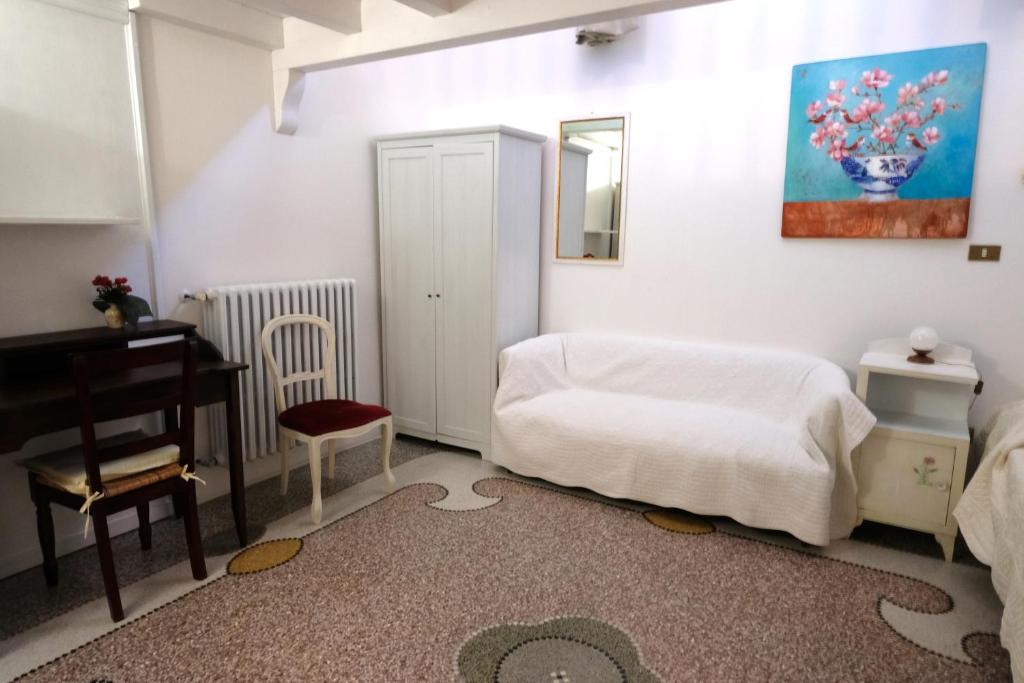 A bed or beds in a room at Ugento Dimora