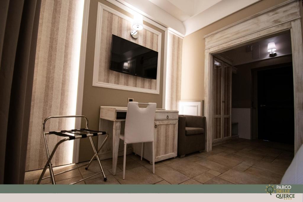 TV a/nebo společenská místnost v ubytování Hotel Parco delle Querce