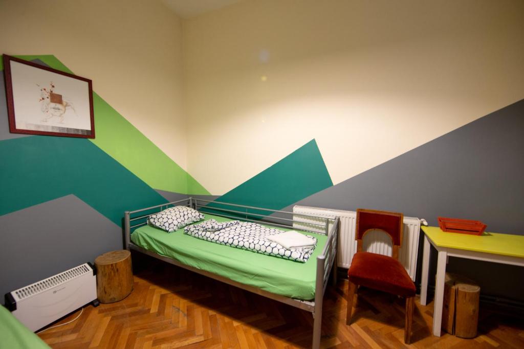 Postel nebo postele na pokoji v ubytování Hostel Cornel
