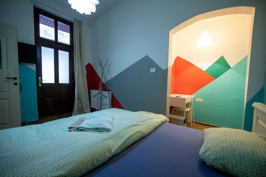 Postel nebo postele na pokoji v ubytování Hostel Cornel