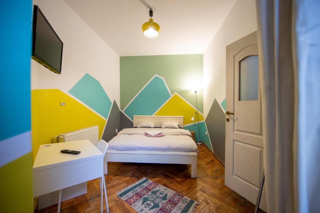 Postel nebo postele na pokoji v ubytování Hostel Cornel