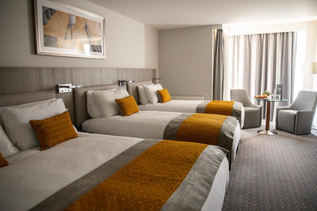 Postel nebo postele na pokoji v ubytování Maldron Hotel Smithfield Dublin City