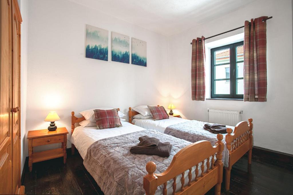 Postel nebo postele na pokoji v ubytování Chalet Jora - Total Chalets