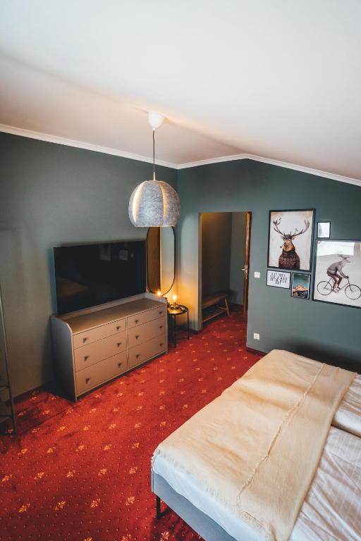Postel nebo postele na pokoji v ubytování Hotel Sportalm - Adults Only Boutique Hotel