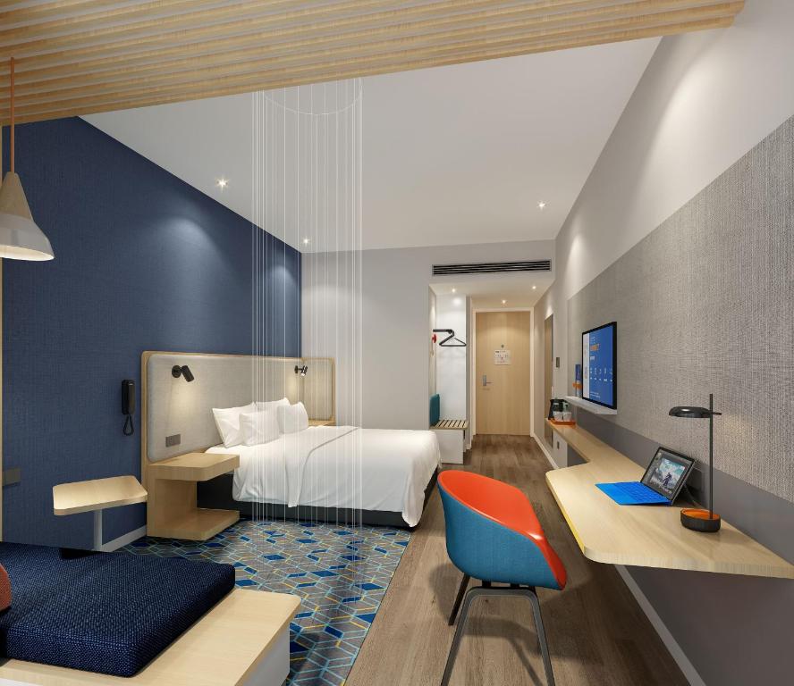 Postel nebo postele na pokoji v ubytování Holiday Inn Express Shanghai Pudong Zhangjiang by IHG - 20 minutes to New International Expo Center and Disneyland