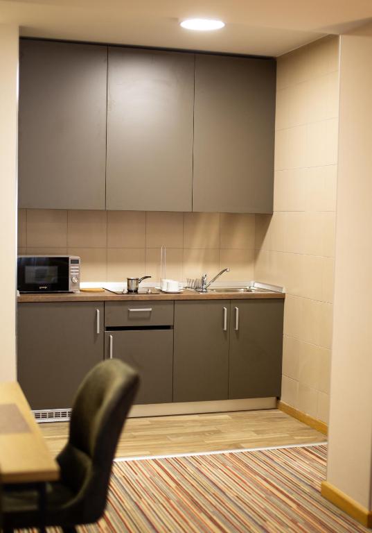 Kuchyň nebo kuchyňský kout v ubytování Hotel TESLA - Smart Stay Garni